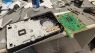 laboratorio ps5 » Riparaora Open gaming console on a repair bench with exposed motherboard, cooling fan, and interior chassis.